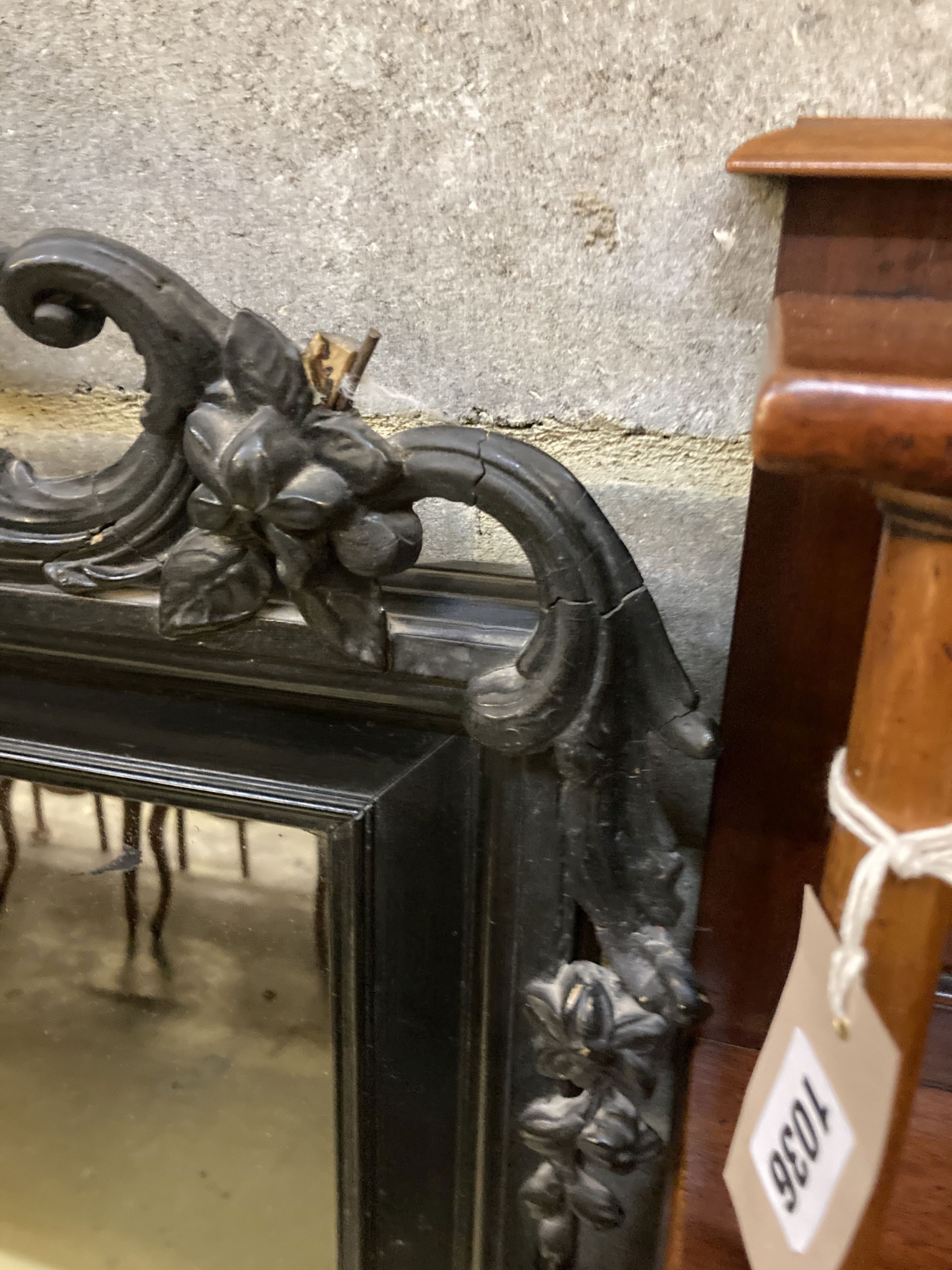 A 19th century French ebonised wall mirror, width 86cm, height 158cm